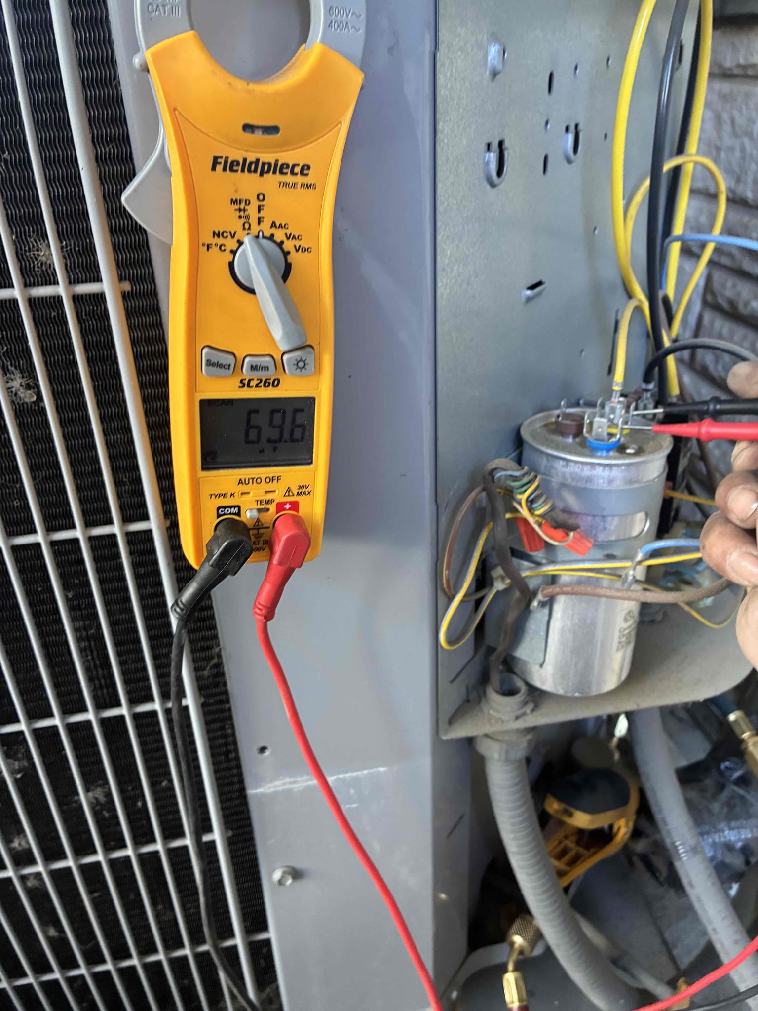 I conducted a thorough maintenance and safety inspection on a 2019 Carrier system paired with a 2009 Coleman furnace. The client reported loud noises and concerns about the thermostat and electrical breaker. Upon inspection, the thermostat was found unsecured, and the blower area was the source of the noise. A dirty 14x25x1 filter was replaced. The system operated correctly in cooling mode with proper refrigerant pressures. However, maintenance had been neglected, with the blower wheel and motor heavily soiled, and the blower capacitor reading below the required 10.00 MFD. The condenser coils were also dirty. Recommendations include securing and replacing the thermostat, replacing the blower capacitor, professionally cleaning the blower wheel and motor, and cleaning the condenser coils. Regular maintenance is advised to prevent future issues.