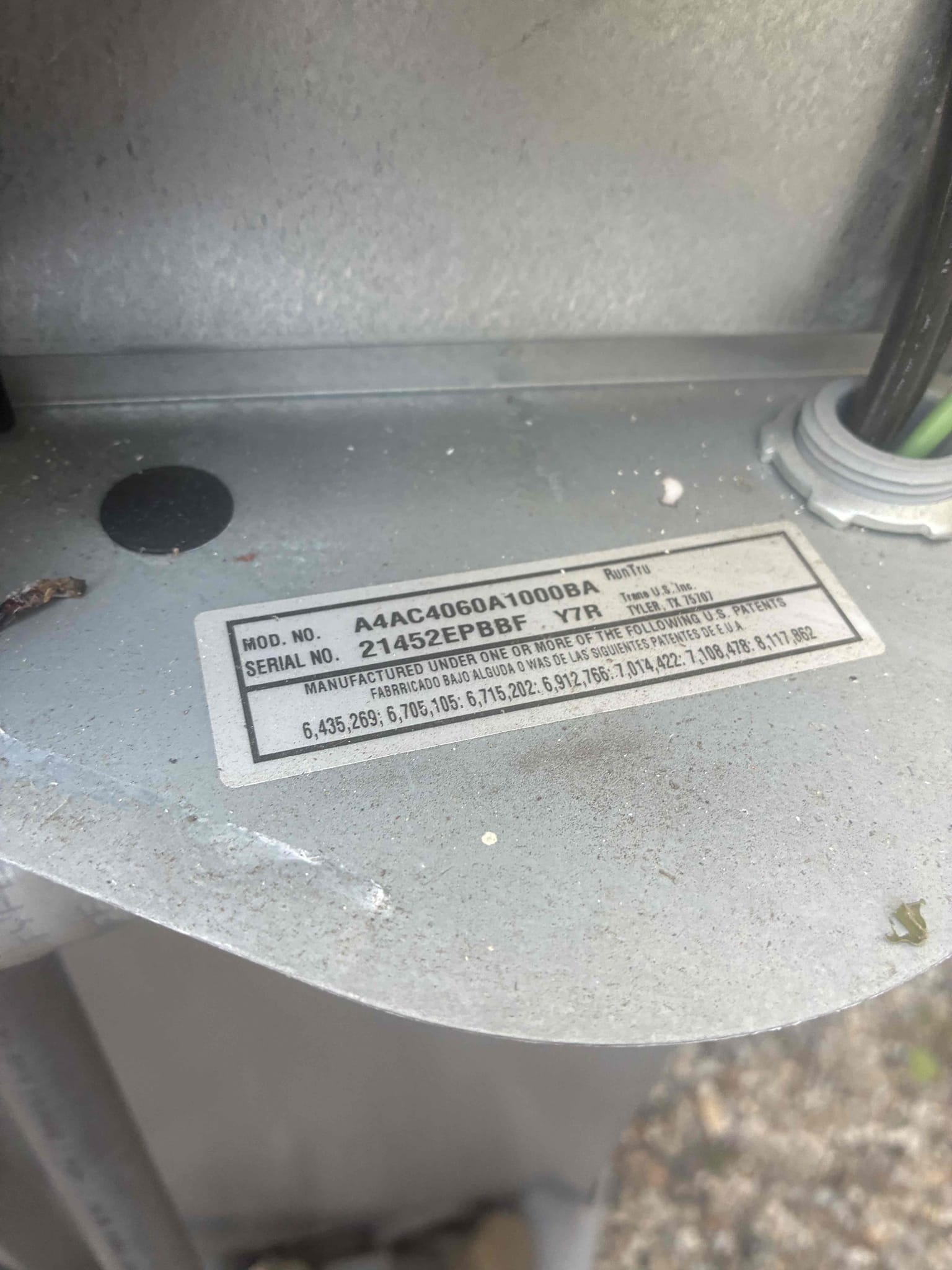 Upon arrival, I inspected a Nordyne/Ameristar System that was not providing cooling and had a thermostat cycling on and off. The issue was confirmed during the inspection. I accessed the attic and discovered that the furnace/air handler access door was not properly secured, causing the door safety switch to disengage. I reattached the door switch, and the system started operating correctly. While the blower was running, I noticed a rattling noise in the attic, which was not audible inside the home. The tenant mentioned that another contractor had been there a month ago for a water leak and did not secure the equipment door properly. I performed a maintenance inspection and found the 70/5 dual run capacitor reading low at 67.4/3.5, below the acceptable range. I recommend replacing the capacitor to prevent future breakdowns. Additionally, I changed the 20x25x1 filter for the client. The system is now operating correctly.