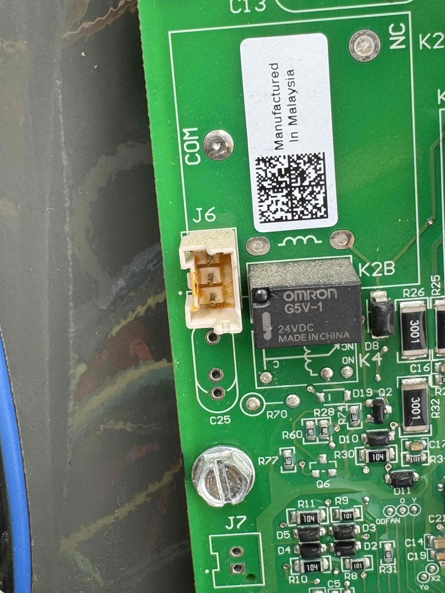 Upon arrival, I first checked the system's cooling demand and found the outdoor condenser fan was not operating. I verified the capacitor and contactor, both of which tested within manufacturer specifications. I confirmed 240 volts at the ECM condenser fan motor during operation. The compressor started and ran normally, but the condenser fan motor did not respond. I inspected the wiring harness and connectors, finding no significant damage. After thorough testing, I diagnosed a failed ECM condenser fan motor assembly and proceeded with the replacement.