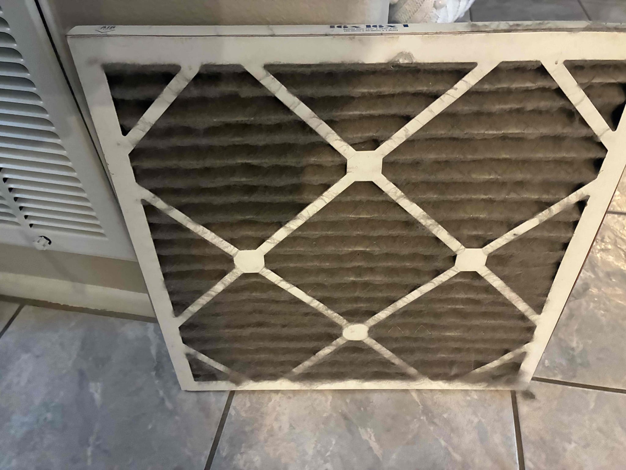 I was called to address a no-cooling issue with a 2000 A/C system. Upon inspection, I noticed the condenser fan motor was running backward. I opened the electrical compartment and identified a visibly swollen dual-run capacitor, indicating it had failed. I replaced the faulty capacitor with a new one and tested the system. The condenser fan started rotating in the correct direction, and the system resumed normal cooling operation. The failed capacitor was the root cause of the issue, and the system is now cooling properly. Given the equipment's age, approximately 25 years, I recommend continued maintenance to prevent future age-related component failures.