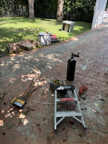 We conducted a thorough diagnostic evaluation of the air conditioning system after the homeowner reported it was not cooling despite recent repairs. We verified the system was discharged of refrigerant, with resting pressures indicating minimal R-410A. A visual inspection of the indoor and outdoor equipment and piping was performed, but the leak source was not identified. We recommended a nitrogen pressure leak test to locate the leak accurately. We also discussed replacing the outdoor condenser, given the recent indoor coil replacement. No repairs were made during this visit.