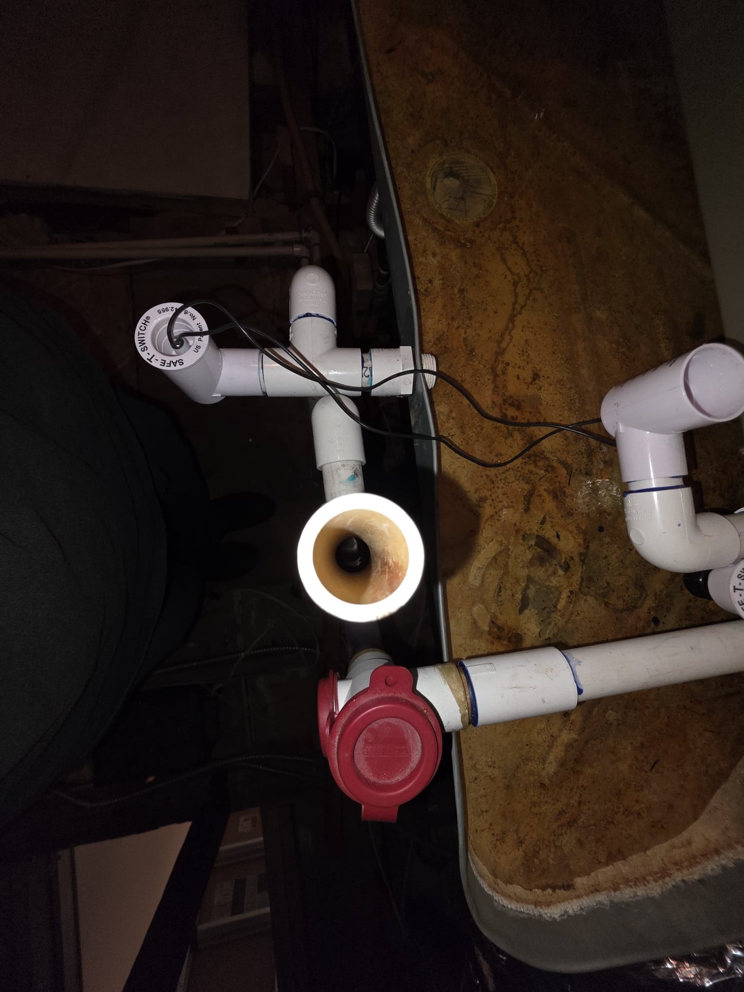 Upon arrival, I identified that the HVAC system was not cooling. The system in question was a three-ton Bryant unit using R-410A refrigerant, installed in 2024. Upon further inspection, I discovered that the condensation drain line was obstructed, causing the condensation pan to overflow with water. This overflow activated both safety switches, preventing the blower from operating. To temporarily resolve the issue, I removed the primary safety switch from the secondary drain line, allowing the system to blow cold air. Moving forward, I recommend clearing the condensation drain line and cleaning the coil to ensure proper water evacuation from the evaporator coil. Once adequate airflow is restored, the refrigerant charge should be verified and adjusted as necessary.