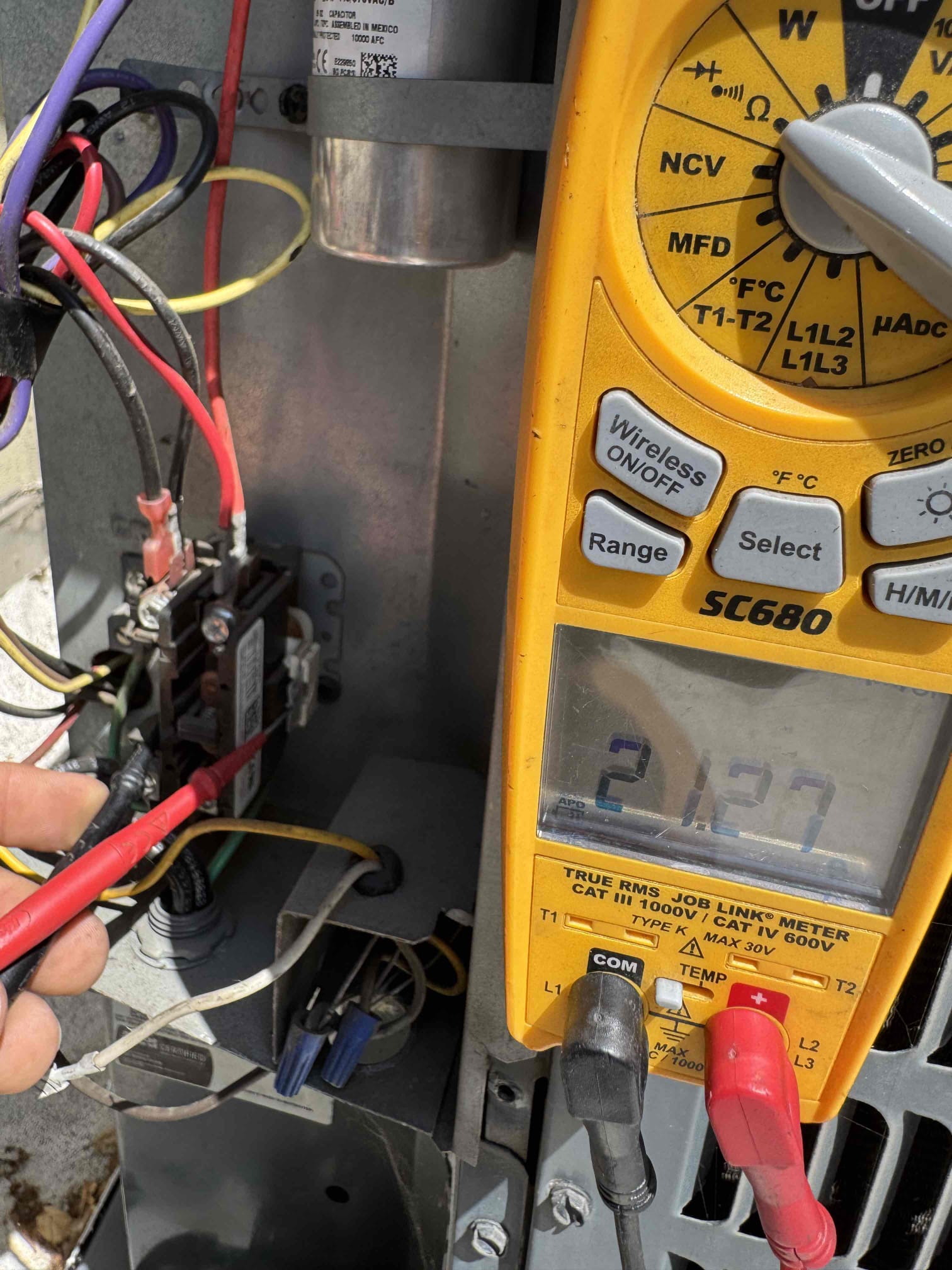 During the inspection, I found the outdoor HVAC unit had no R-410A refrigerant, indicating a significant leak. The capacitor tested fine, but the contactor readings were unstable, suggesting it needs replacement. The auxiliary drain pan showed heavy rust and condensate buildup, necessitating replacement. The primary condensate drain also required clearing and verification for proper drainage.
Temporary repairs included replacing the outdoor contactor, applying leak sealant with UV dye, recharging the system to factory specifications, replacing the auxiliary drain pan, and clearing the primary drain line. Given the refrigerant leak and equipment condition, these repairs come with no warranty or guarantee. A full system replacement is recommended. The outdoor condenser and furnace were manufactured in May 2016, and the evaporator coil in August 2013.