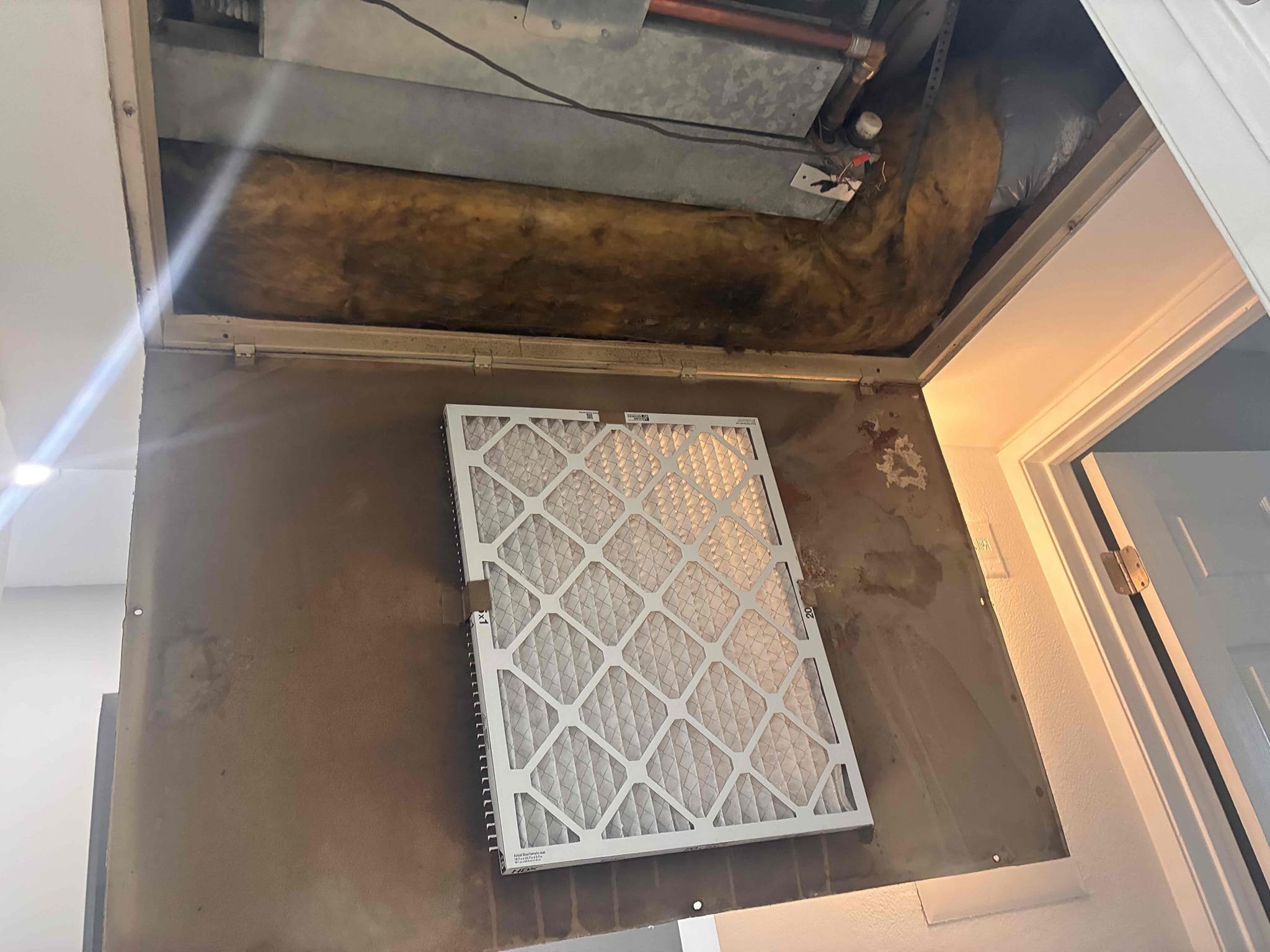 During the HVAC inspection, I tested a 1990s 1.5-ton fan-coil heat-pump system. Cooling mode functioned correctly, but heating mode failed as the rooftop condenser did not start. Power and a 24-volt heating signal reached the outdoor control board, but the reversing-valve relay did not switch. Due to the system's age and condition, repairs are not advised. Replacement parts may be hard to find, and any repair would be temporary. A complete system replacement is recommended for reliable long-term performance.