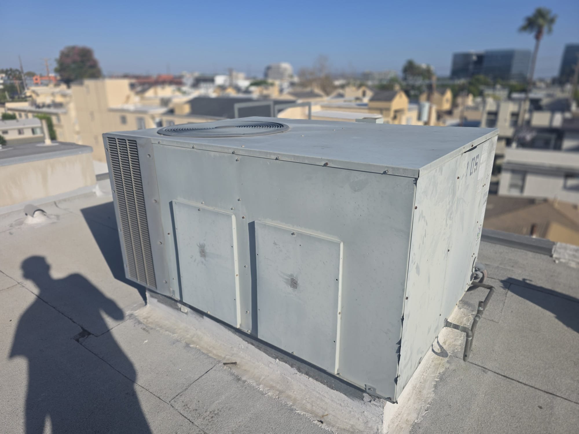 Upon arrival, I assessed a 21-year-old package unit with reported issues of unusual noise and failure to turn on. I began by examining the system's major components to determine if the unit was indeed operational. Despite the customer's concerns, the unit was receiving power, and no major complications were evident. Temperature differentials between the return and supply air showed an eighteen-degree difference. Further inspection of the coil revealed severe rust, which could potentially indicate a slight refrigerant leak. I recommended addressing the rust and investigating the refrigerant levels to ensure the unit's efficiency and longevity.