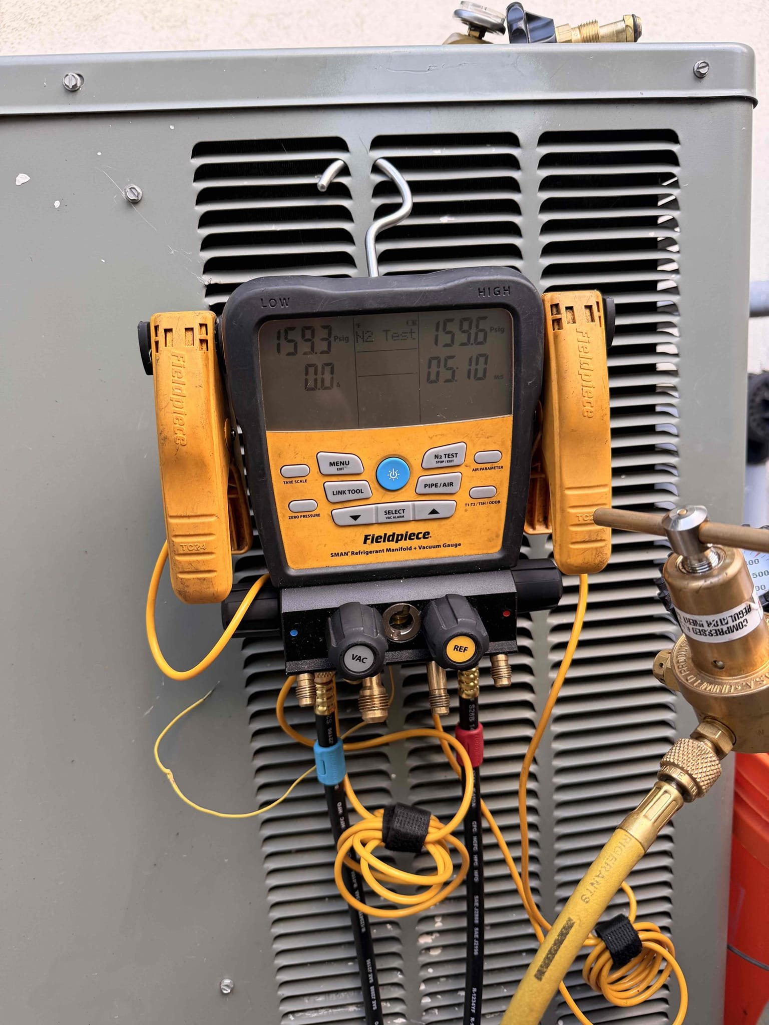 We began by safely recovering the remaining refrigerant from the unit. Next, we removed the existing thermal expansion valve (TXV) and filter dryer. The line set was then flushed using RX 11 to ensure cleanliness. A new TXV and filter dryer were installed, followed by pressurizing the unit with nitrogen to 450 PSI to check for leaks. All identified leaks were sealed, and a triple vacuum was pulled to 500 microns, purging with nitrogen between each vacuum to remove air and moisture. The unit was charged with R410A refrigerant according to the manufacturer's specifications. This repair is considered a temporary fix, and while we guarantee our workmanship, we cannot guarantee the lifespan of the equipment or any parts not replaced. Payment is 50% deposit and 50% upon completion.