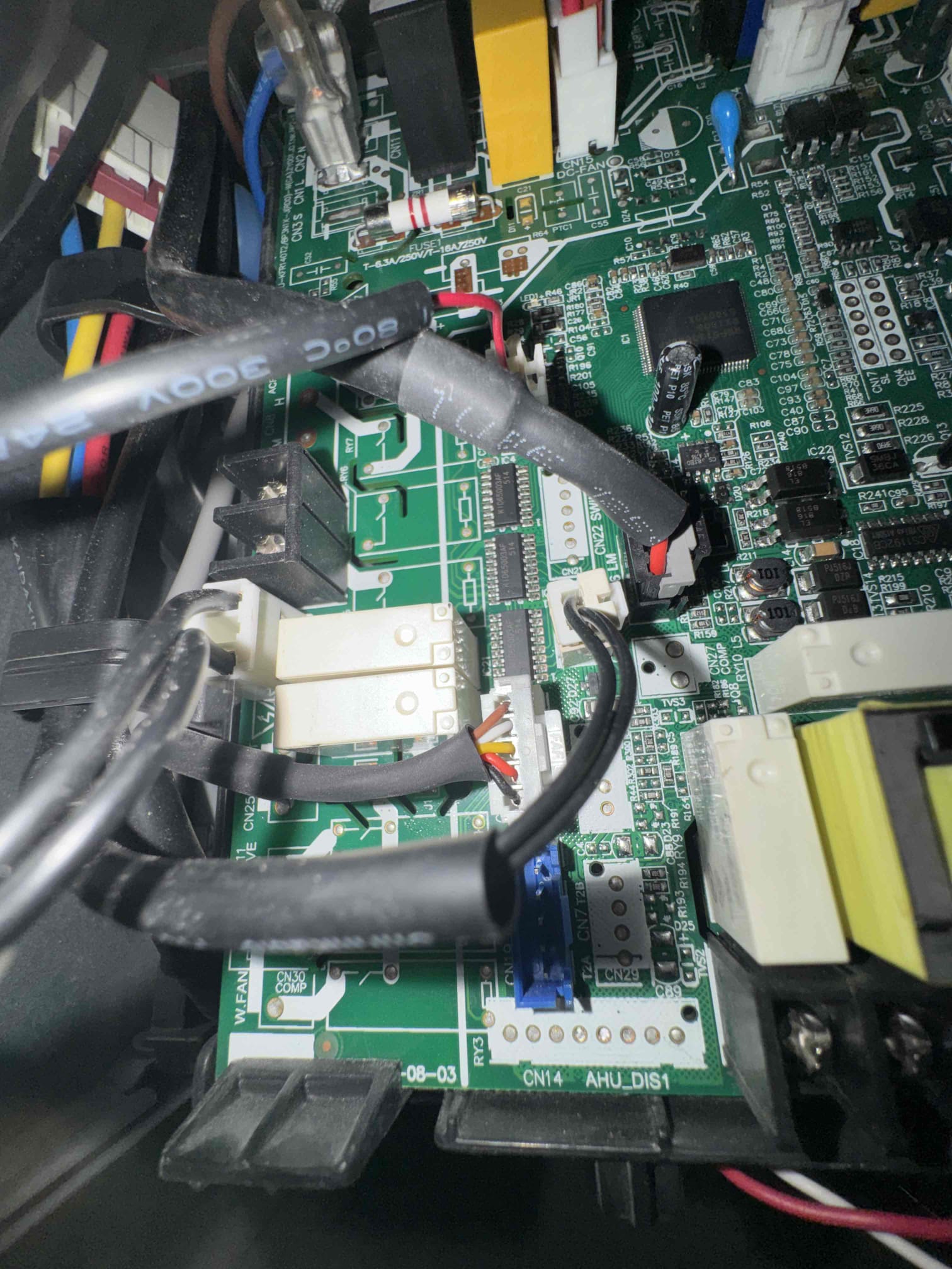 Upon arrival, the ACiQ system was non-operational, with the air-handler blower rattling above 20% operation. The thermostat displayed an EH61 error. After power restoration, the unit briefly started then shut down with a water-level alarm. A test with the CN5 water connection disconnected allowed it to run for five minutes without cooling, displaying EH0E. The T2 sensor measured 8.35 �, and the blower was unbalanced. Refrigerant pressures were 222.5/222.9 psig. Recommend replacing the indoor control board, CN47 T2 sensor harness, and CN5 water-level harness, and addressing the blower issue.