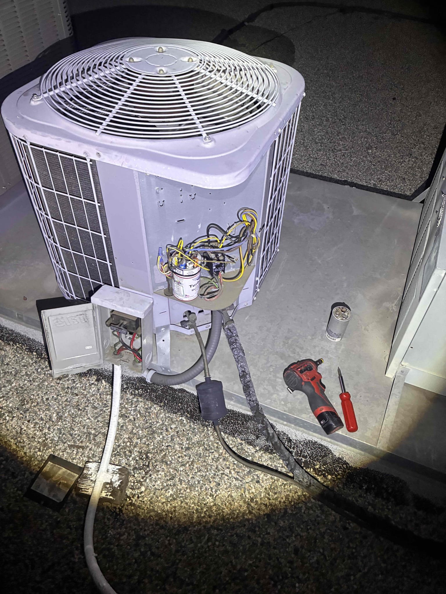 I replaced an incorrectly sized circuit breaker and a defective dual-run capacitor for the outdoor A/C condenser. First, I removed the existing double-pole 15-amp breaker and verified the electrical wiring and compatibility with the panel. I then installed a double-pole breaker rated at 17.5A MCA / 25A maximum overcurrent protection, as specified by the condenser manufacturer. Next, I replaced the failed 35/5 µF dual-run capacitor, which tested below acceptable levels, with a new properly rated capacitor. After restoring power, I tested the condenser operation, checked the compressor and fan motor amperage, and ensured the breaker held without tripping. Proper cooling performance was confirmed. Note that further diagnosis may be needed if the breaker continues to trip.