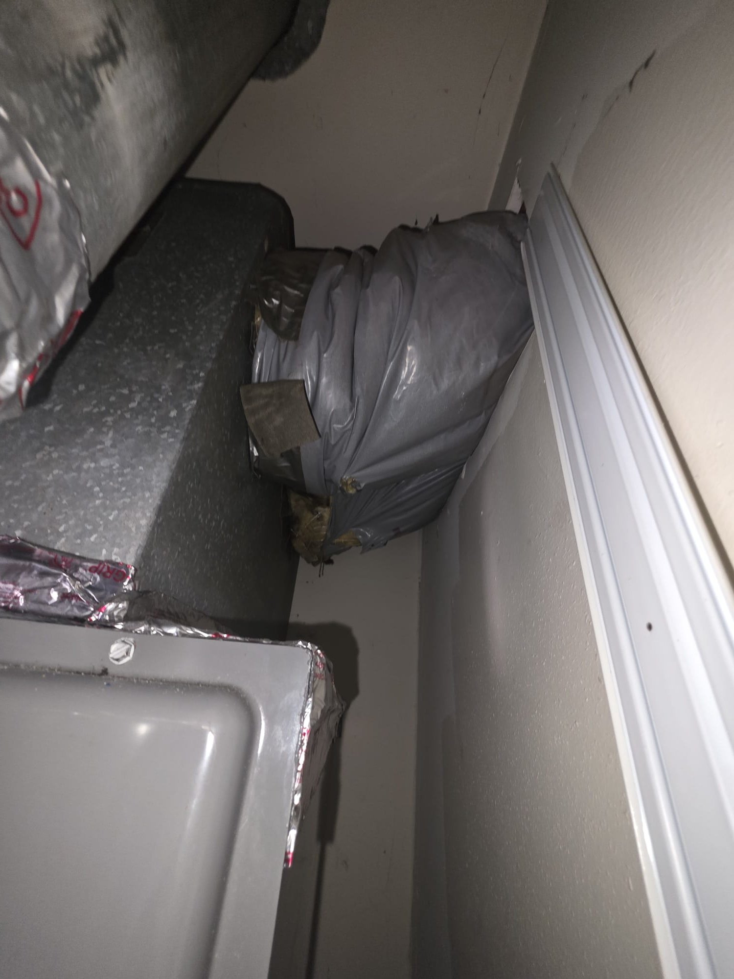 Upon arrival, I identified a four-year-old furnace that had been red-tagged by the gas company. The issue was related to the mixing of unconditioned and conditioned spaces. The return air intake could potentially draw in unconditioned air, risking carbon monoxide contamination. Additionally, negative static pressure could pull natural gas into the conditioned space. I recommended sealing the return cavity, weatherproofing the return grill, and installing duct board inside the furnace to ensure only conditioned air is introduced. Upon arrival, I identified a four-year-old furnace that had been red-tagged by the gas company. The issue was related to the mixing of unconditioned and conditioned spaces. The return air intake could potentially draw in unconditioned air, risking carbon monoxide contamination. Additionally, negative static pressure could pull natural gas into the conditioned space. I recommended sealing the return cavity, weatherproofing the return grill, and installing duct board inside the furnace to ensure only conditioned air is introduced.