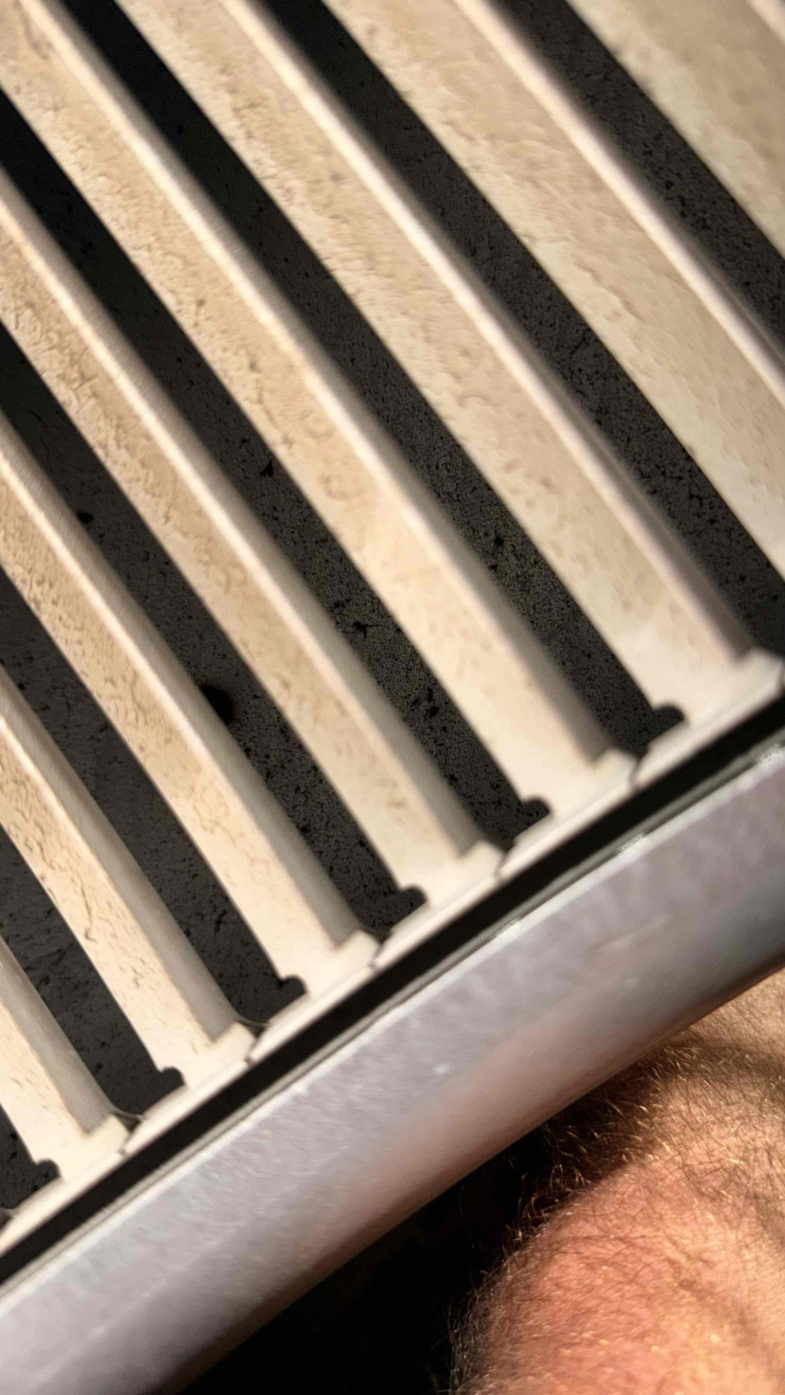 During the maintenance inspection, I discovered that the blower motor was significantly dirty, which could affect its efficiency. The air filter was also heavily soiled, leading to a dirty return air duct. To address these issues, I cleaned the blower motor thoroughly and replaced the dirty filter with a new one. Additionally, I recommended a comprehensive duct cleaning and condenser cleaning to ensure optimal system performance and indoor air quality.