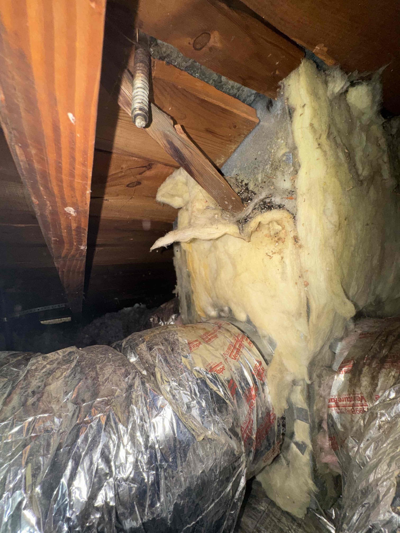 Returned today to inspect the attic duct system before installation of the new HVAC equipment. A total of eight existing supply duct runs were evaluated. Multiple ducts were found compressed, sharply bent, poorly supported and restrictive, which can reduce airflow, create uneven temperatures, increase system static pressure and negatively affect the performance of the new equipment.
Due to the age and condition of the existing duct system, replacement is strongly recommended as part of the new system installation. Recommended improvements include:
* Install a new properly sized and sealed supply plenum.
* Replace all eight supply runs with six 8-inch and two 6-inch R-8 insulated flexible ducts.
* Properly stretch, route and support the new ducts to minimize compression and airflow restriction.
* Install balancing dampers and reconnect the ducts to the existing supply registers.
* Seal all duct and plenum connections.
* Increase the existing return-air opening to approximately 20 × 30 Returned today to inspect the attic duct system before installation of the new HVAC equipment. A total of eight existing supply duct runs were evaluated. Multiple ducts were found compressed, sharply bent, poorly supported and restrictive, which can reduce airflow, create uneven temperatures, increase system static pressure and negatively affect the performance of the new equipment.
Due to the age and condition of the existing duct system, replacement is strongly recommended as part of the new system installation. Recommended improvements include:
* Install a new properly sized and sealed supply plenum.
* Replace all eight supply runs with six 8-inch and two 6-inch R-8 insulated flexible ducts.
* Properly stretch, route and support the new ducts to minimize compression and airflow restriction.
* Install balancing dampers and reconnect the ducts to the existing supply registers.
* Seal all duct and plenum connections.
* Increase the existing return-air opening to approximately 20 × 30
