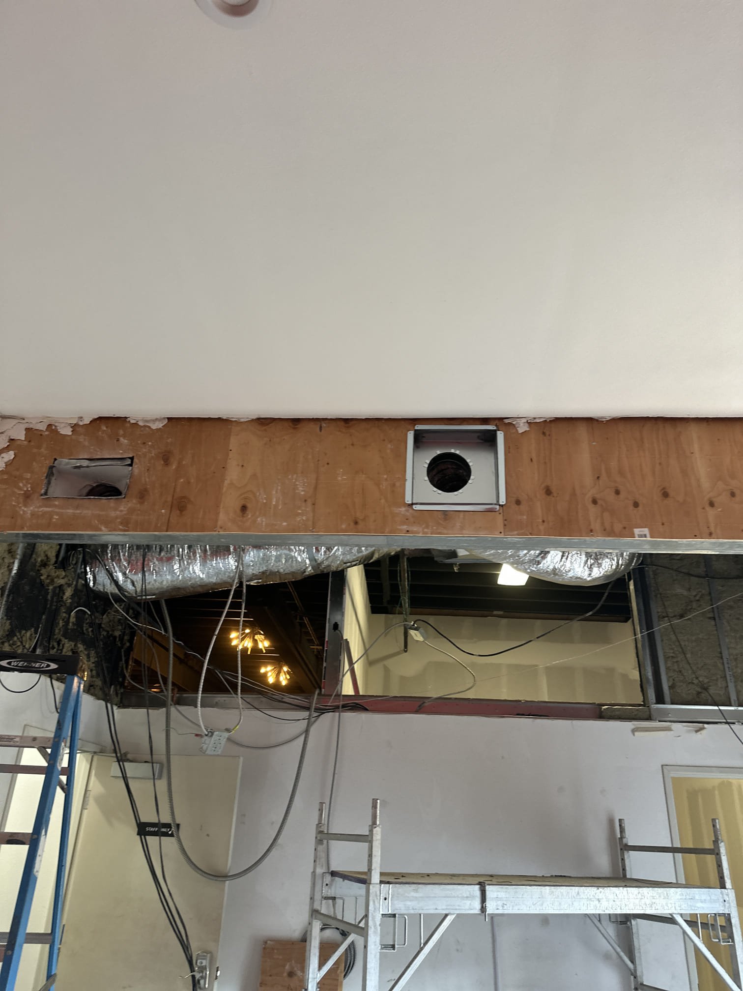 Our team completed a comprehensive HVAC system overhaul, focusing on three distinct areas. In the front entrance showroom, we removed existing ducting and insulation, sealed the plenums, and installed new airflow registers and returns. The back showroom saw the removal of flex ducting, plenum shortening, and the installation of new spiral ducts and registers. The back storage area underwent plenum shortening, duct reconnection, and smoke detector relocation. We also installed new filters, thermostat wiring, and temperature sensors. After thorough testing, we demonstrated system operation and programming to the customer, providing recommendations based on our findings.
