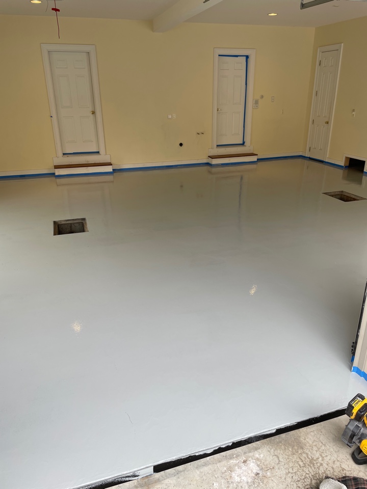 A basecoat of permaflex for this two car garage floor. Are you ready to start your own decorative concrete project?