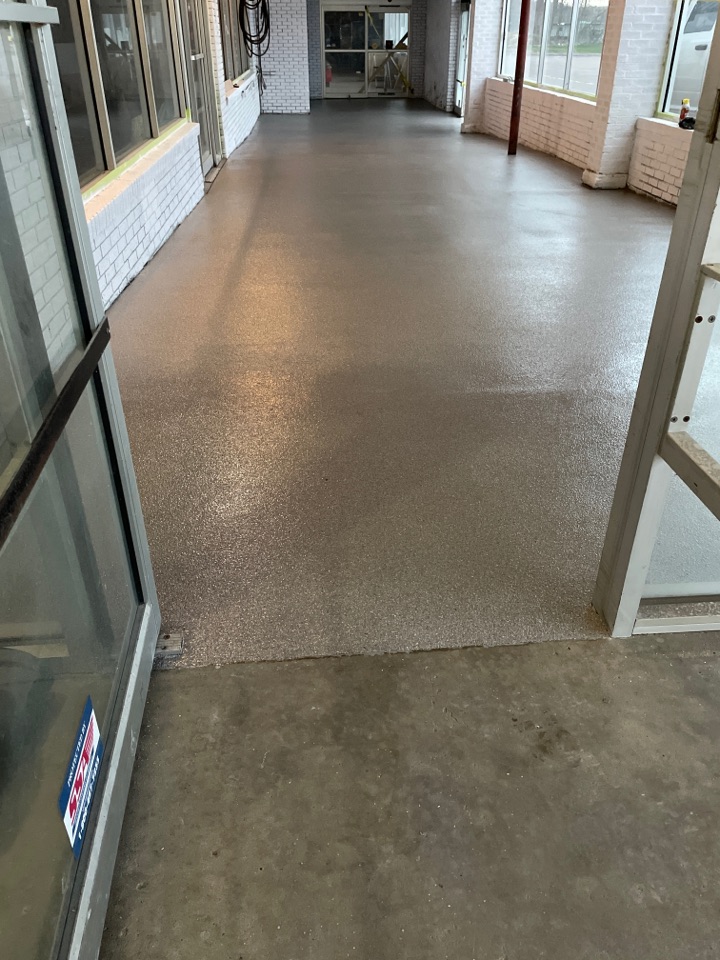 Concrete epoxy floor flake system for a grocery store entrance. Are you ready to start a decorative concrete project?