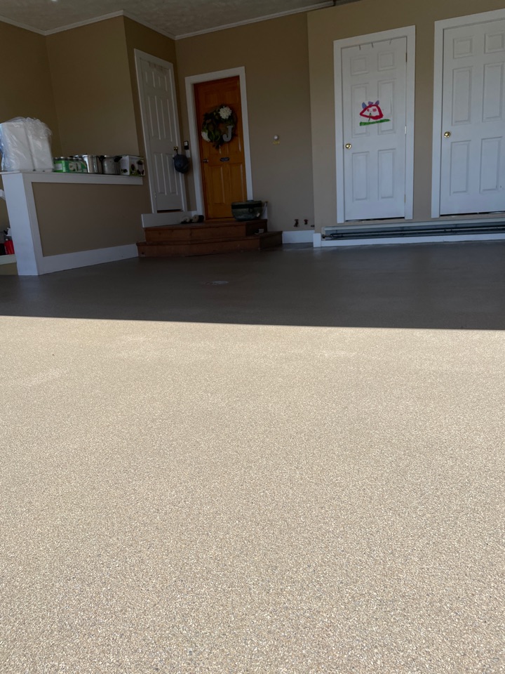 Another coat of Poly 90 and this concrete garage floor is a wrap. Another happy customer. Are you ready to start your own decorative concrete project?