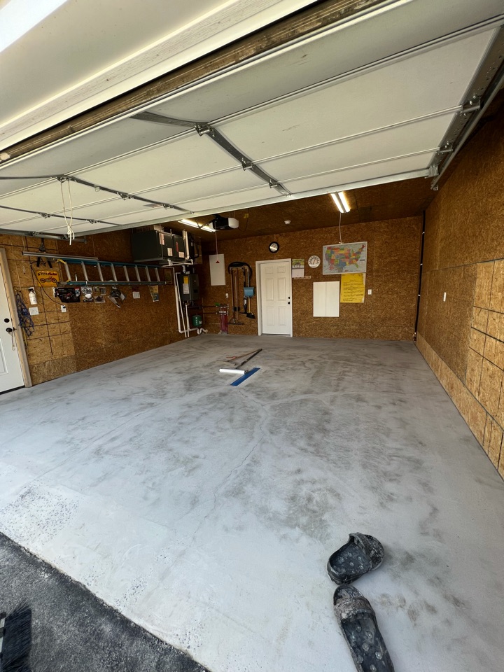 Prepping for a domino flake application on a concrete garage floor. Are you ready to start a decorative concrete project?