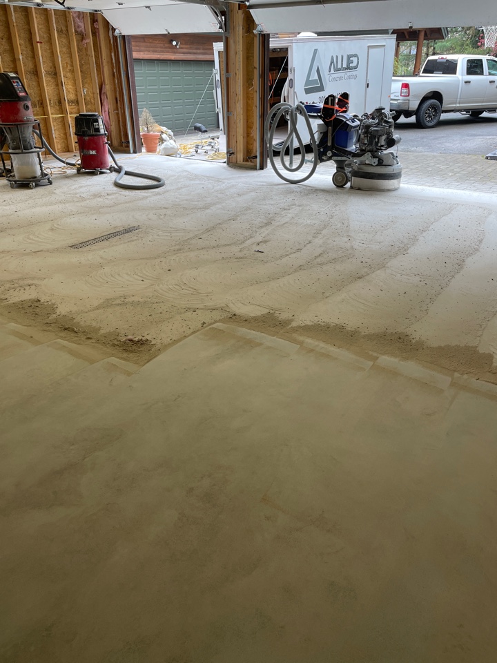 Prepping a garage floor for an epoxy flake floor with our Warrior Grinder. It makes quick work out of these garages and gets us the profile we need to ensure a good bond. Are you ready to get a concrete coatings project started?