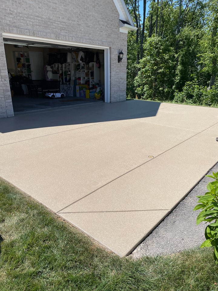 Another Cracked and pitted driveway restored with Graniflex 