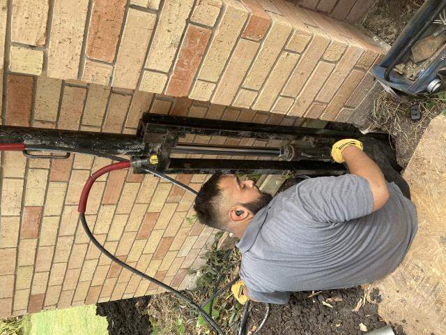 Our foundation repair project is underway. Today we are installing the piers until they hit bedrock. After this we'll move on to stabilizing and lifting the house. 