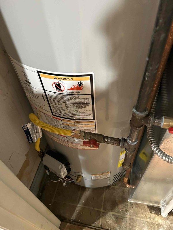 Removed and temporarily detached return ductwork, gas lines, and humidifier ducting as required to facilitate water heater replacement by customer's plumbing contractor. After plumbers completed installation of new water heater, reinstalled all ductwork and connections to original specifications, ensuring proper sealing and alignment of all HVAC components.
