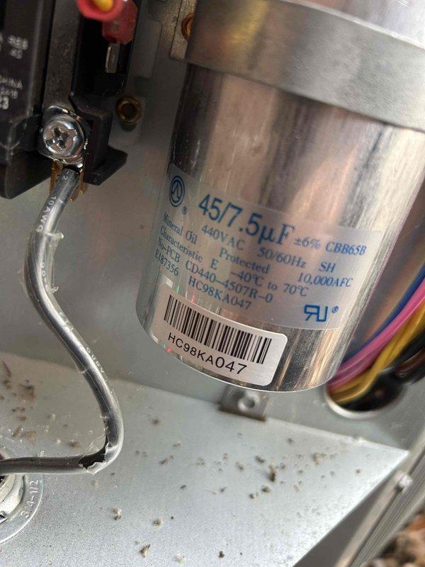Performed care plan tune-up service on heat pump/gas furnace system located in basement. Inspected and tested dual run capacitor (45/7.5μF) using Fieldpiece multimeter which displayed reading of 732 microfarads, indicating capacitor is operating properly. Filter size verified as 16x25x1.