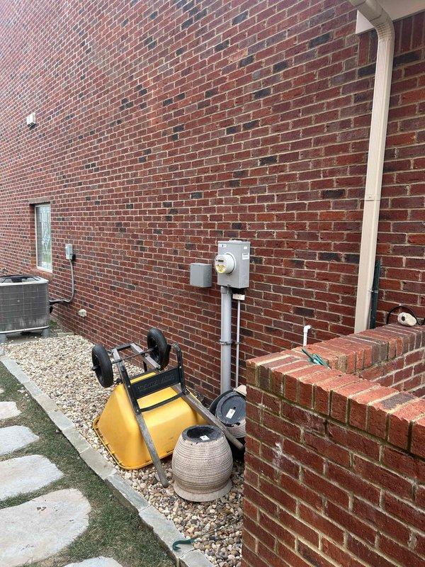Performed scheduled care plan tune-up on heat pump system. Inspected exterior condenser unit installed on gravel bed next to brick structure. Checked refrigerant lines and connections at the evaporator coil, confirming proper installation with no visible leaks. Customer provides their own Aprilaire 210 filter as per maintenance agreement.