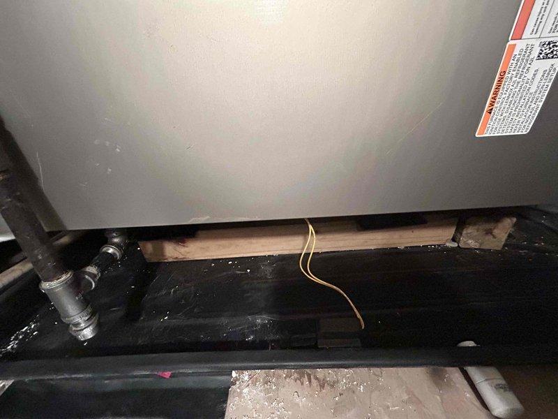 Successfully installed a Lennox 70K BTU 97% efficient Elite Series Two-Stage Gas Furnace (EL297UH070XE36BK) in the attic. Installed auxiliary drain pan beneath the furnace and connected to existing thermostat and flue piping. Project included installation of transition to evaporator coil, standard air filter rack, electrical and gas shut-off switches, and flexible gas line connector.
