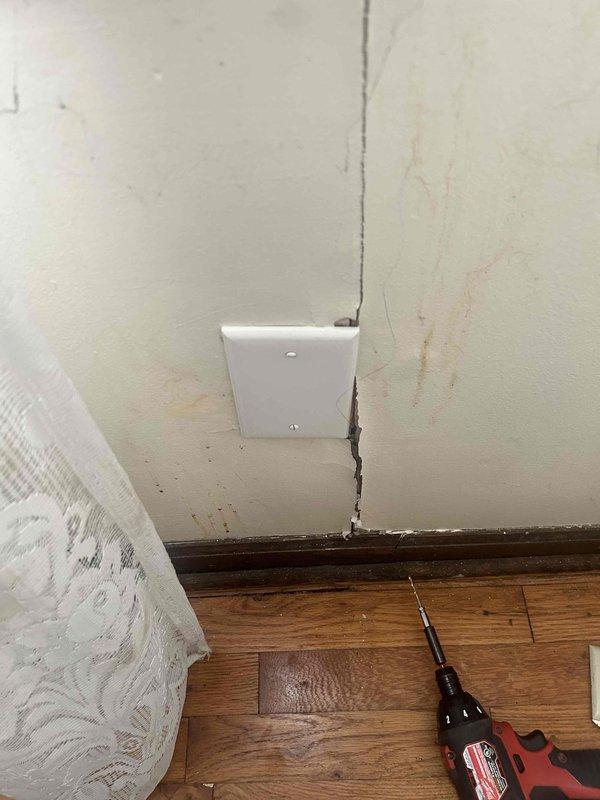Replaced two faulty duplex receptacles in bedroom after finding significant wall damage and deteriorated wiring around the electrical boxes. Installed and connected customer-supplied ceiling fan, ensuring proper mounting and electrical connections despite challenging wall conditions that included a substantial vertical crack in the drywall.