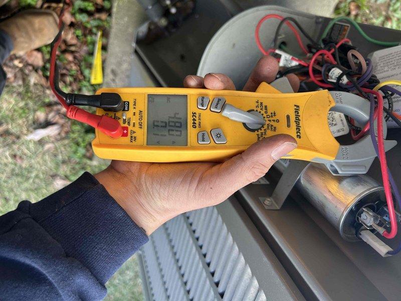Successfully replaced inducer motor on Carter furnace to restore proper functionality. Verified electrical components using Fieldpiece SC440 multimeter, confirming proper amp draw of 1.00 after installation.