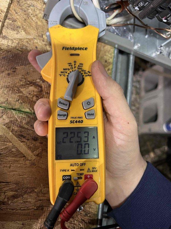 Diagnosed electrical malfunction in HVAC system traced to thermostat programming issue. Performed hard reset of thermostat and reprogrammed it to properly operate with 15 KW heat kit, resolving insufficient heating caused by partial heat strip activation. Verified proper amp draw with Fieldpiece SC440 clamp meter during system operation.