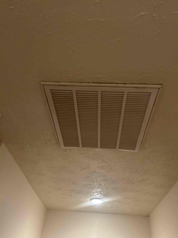 Responded to a client-reported "clanking" noise from the cold air return system located in attic. Upon inspection, removed and examined the return air grille and filter assembly, finding debris causing fan blade interference. Cleaned components and reinstalled correctly, eliminating the noise issue during system operation.