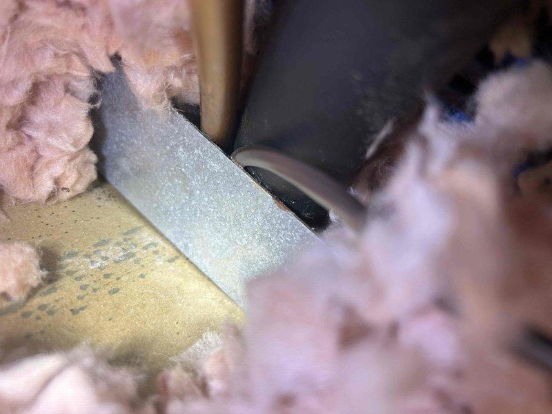 Responded to no-heat service call for 7-year-old electric HVAC system. Diagnosed recurring issue where fuse was repeatedly blowing and shutting down the system. Inspected attic-located indoor unit, verified proper insulation integrity around ductwork and components, and confirmed Ecobee thermostat was functioning correctly but registering below setpoint temperature.