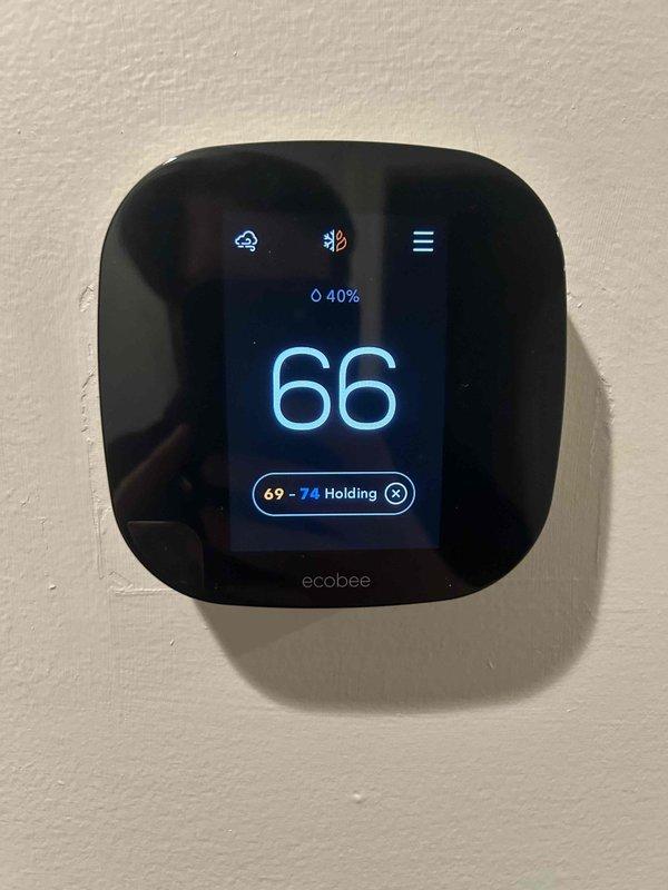 Responded to no-heat service call for 7-year-old electric HVAC system. Diagnosed recurring issue where fuse was repeatedly blowing and shutting down the system. Inspected attic-located indoor unit, verified proper insulation integrity around ductwork and components, and confirmed Ecobee thermostat was functioning correctly but registering below setpoint temperature.