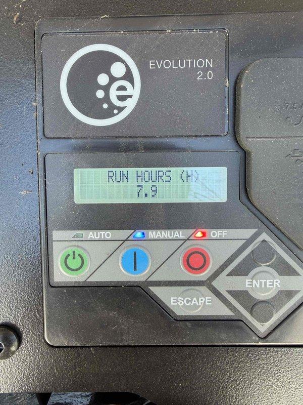 Performed scheduled maintenance on Generac Guardian 24kW standby generator (SN: 3016031226). Unit was in good operational condition with 7.9 run hours displayed on Evolution 2.0 control panel. Inspected generator housing, connections, and mounting on concrete pad adjacent to brick structure. No abnormalities detected during service.
