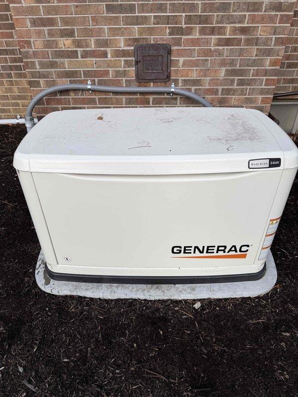 Performed scheduled maintenance on Generac Guardian 24kW standby generator (SN: 3016031226). Unit was in good operational condition with 7.9 run hours displayed on Evolution 2.0 control panel. Inspected generator housing, connections, and mounting on concrete pad adjacent to brick structure. No abnormalities detected during service.