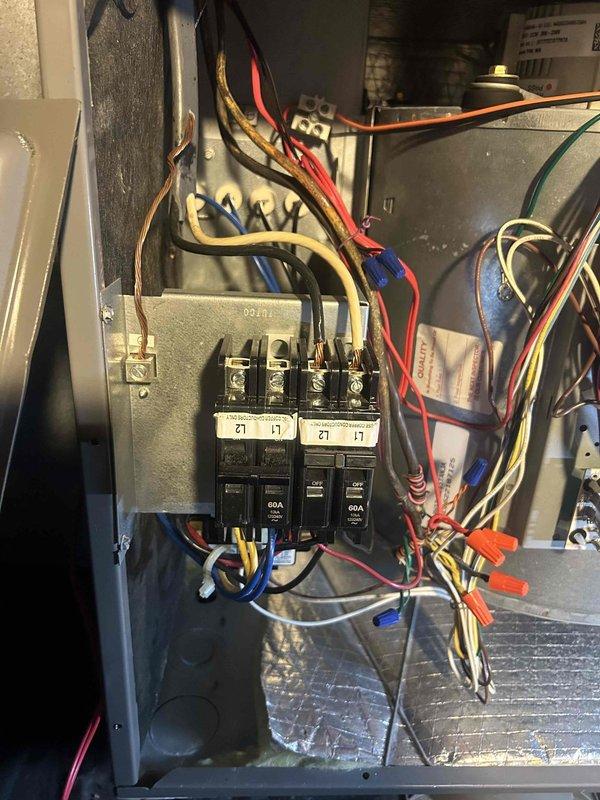 Diagnosed ongoing heating issues in 2022-installed system where customer reported having to set thermostat abnormally high to produce warm air. Inspected electrical panel and verified proper 40A breaker configuration for the upgraded 19.2 KW heat kit (previously 10 KW). Examined ductwork connections in attic space and found flexible insulated ducting properly secured to plenum. Rechecked capacitors and reprogrammed thermostat for optimal heating cycle performance.