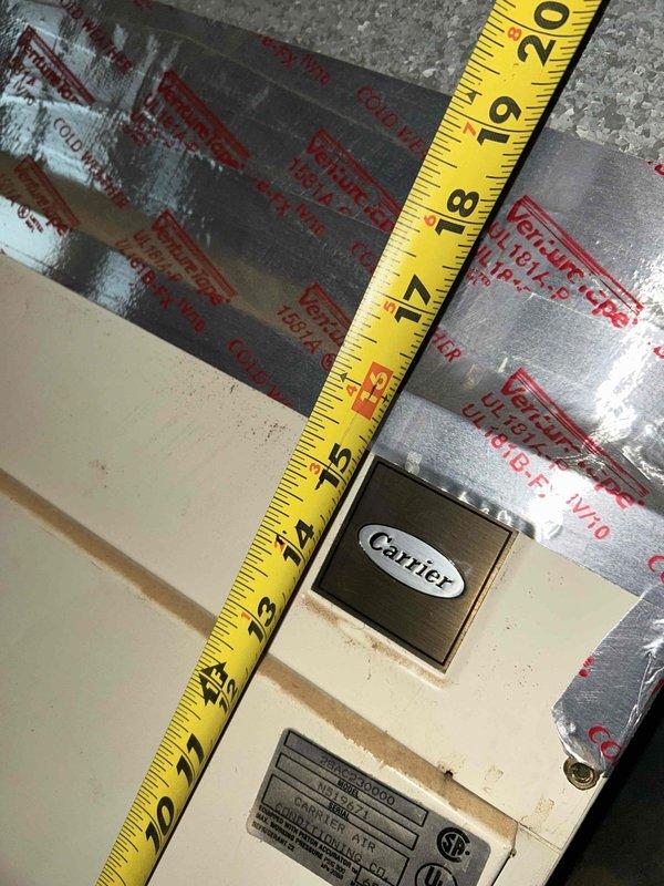 Responded to service call for a gas furnace over 10 years old with no heat issues. Diagnosed system failure in basement-installed Carrier unit. Inspected gas line connections and took measurements of the equipment dimensions to ensure proper clearances and ventilation. Restored heating functionality by cleaning flame sensor and resetting ignition sequence.