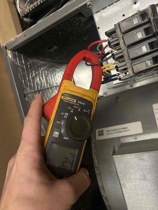 Performed Care Plan Tune Up on heat pump and air handler system. Conducted electrical diagnostics using Fluke 376 FC clamp meter, verifying proper voltage and amperage readings at the circuit panel. Inspected condensate drainage system, confirming proper function of drain pan and associated plumbing components with no signs of blockage or overflow.