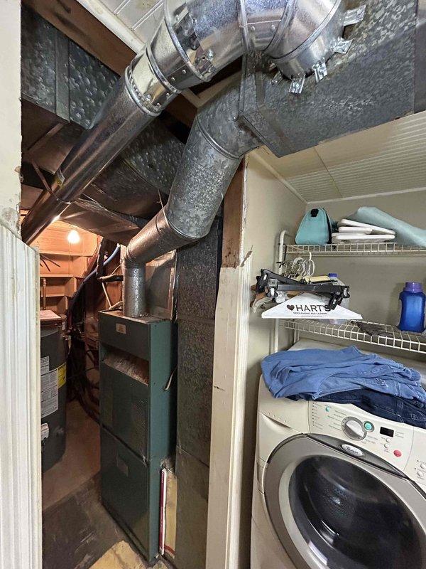 Conducted comprehensive inspection of 30+ year old HVAC system requiring urgent replacement. Current setup includes aging gas furnace located in basement under stairs, accessed through garage, with galvanized metal ductwork system featuring rectangular plenum box connected to round ducts. Customer requires immediate installation and is prepared for cash payment, though financing options may be considered.