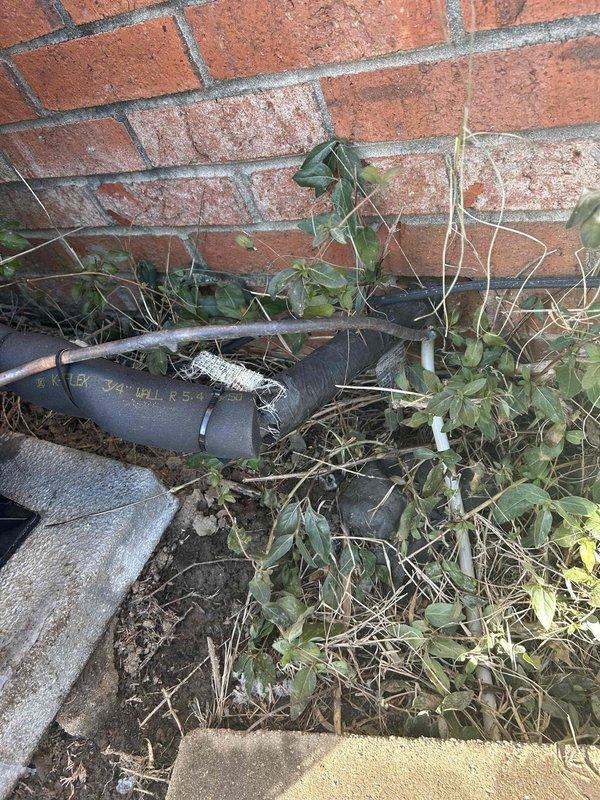 Responded to warranty service call for recently installed heat pump not heating properly. Inspection revealed insufficient refrigerant charge from initial installation as suspected. Observed corrosion at brass valve fitting assembly and inspected exterior line set insulation with visible damage. Added proper refrigerant charge and system now operating within manufacturer specifications.