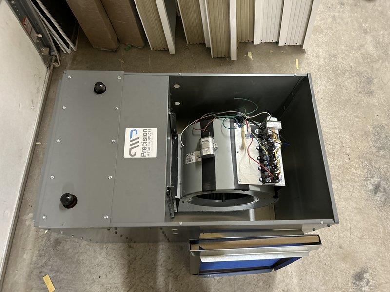 Successfully reconnected green PEX piping from the newly installed air handler to the existing hydronic system with three circulation pumps. Restored water flow to the system and verified proper operation of all components.