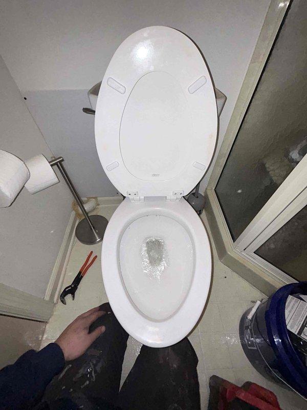 Responded to service call for non-flushing toilet in upstairs bathroom. Inspected toilet mechanism and supply line connection. Identified corrosion and wear on the wall valve where it connects to the braided supply line. Completed necessary repairs to restore proper flushing function.