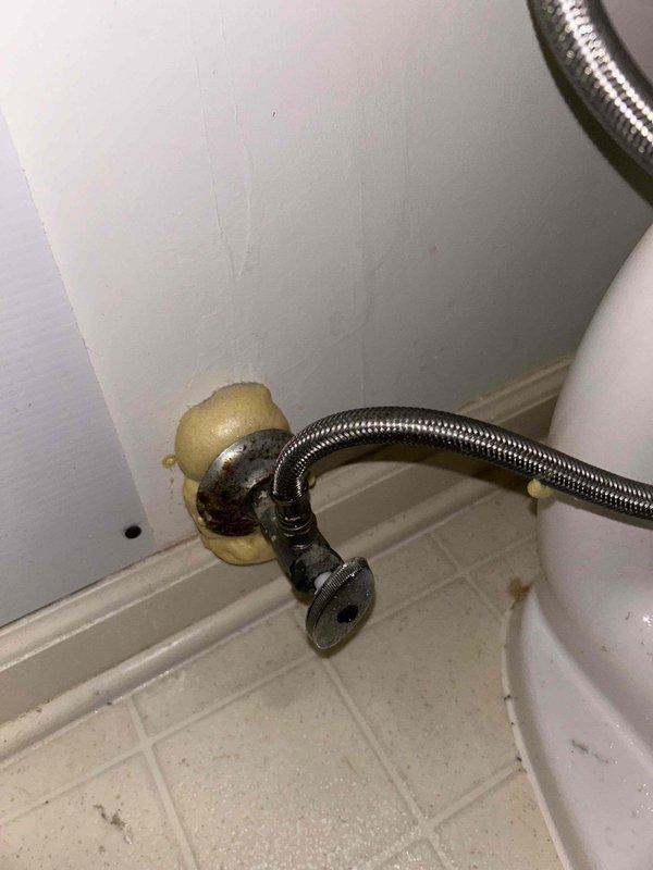 Responded to service call for non-flushing toilet in upstairs bathroom. Inspected toilet mechanism and supply line connection. Identified corrosion and wear on the wall valve where it connects to the braided supply line. Completed necessary repairs to restore proper flushing function.