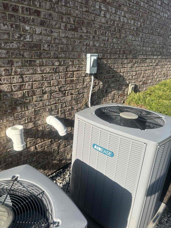 Performed evaluation of 12-year-old non-functional heat pump system for potential replacement. Assessment included inspection of outdoor AirEase units with visible weathering and the indoor air handler unit with connected R-6 insulated ductwork, condensate drainage, and electrical components. Customer has received one quote already and requests expedited replacement before year-end, with financing options to be determined based on final pricing.