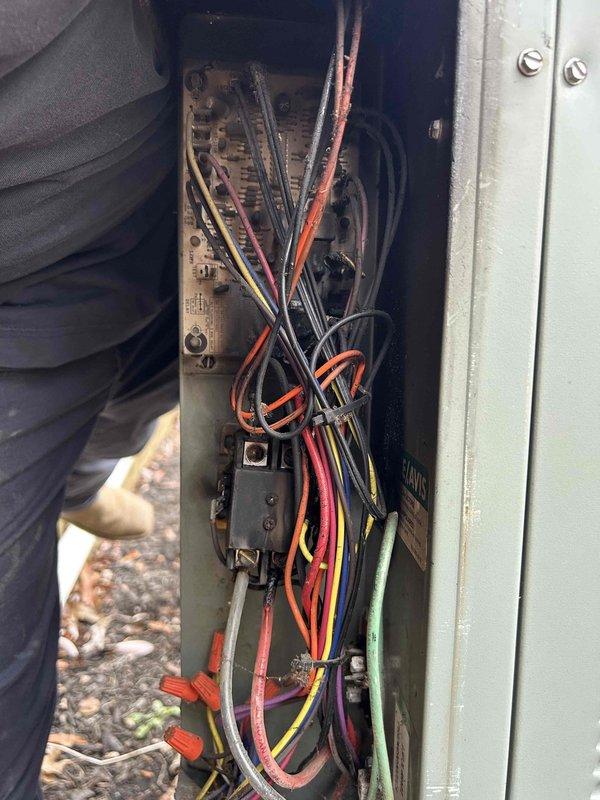 Completed installation of new Bryant heat pump (GH5SAN54800A) and air handler (FJ5ANX048) with 20KW heat kit (TU-EC-20BKB) and Honeywell S200 thermostat. System included standard safety components: SS2 coil drain sensor, overflow pan with water sensor, outdoor unit pad with snow legs, electrical connections, and refrigerant line components. Properly connected all electrical wiring and verified system functionality.