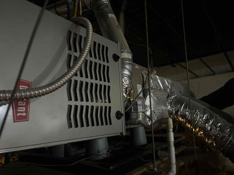 Performed detailed equipment assessment for commercial maintenance contract, cataloging Bryant HVAC system components including ceiling-mounted heating units and basement air handler. Documented all equipment specifications, filter sizes, belt dimensions, and precise equipment locations throughout the facility for comprehensive preventive maintenance planning.