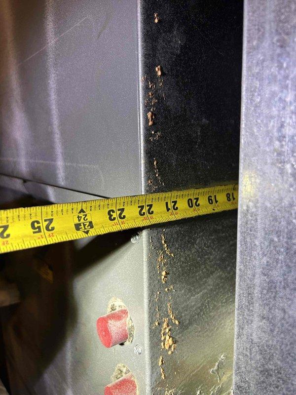Responded to water leak service call for indoor HVAC unit located in upstairs closet. Upon inspection, discovered corrosion along the metal seam of the air handler, indicating ongoing water leakage that had been occurring for several days. Measurements were taken to assess affected areas and necessary repairs.