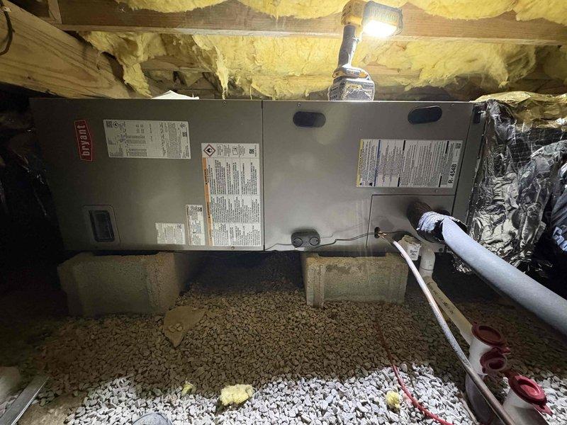 Successfully installed a complete dual heat pump system, including a 1.5-ton Bryant GH5 15.2 SEER2 heat pump for the rear zone and a 2-ton Bryant GH5 for the front zone, paired with Bryant FJ5 series air handlers with 7.5kW and 10kW auxiliary heat kits respectively. Relocated front thermostat to interior wall, installed Honeywell FocusPro WiFi-enabled thermostats, and completed all necessary connections including new basebox with filter rack, return plenum, outdoor equipment pad, snow legs, electrical disconnects and whips.