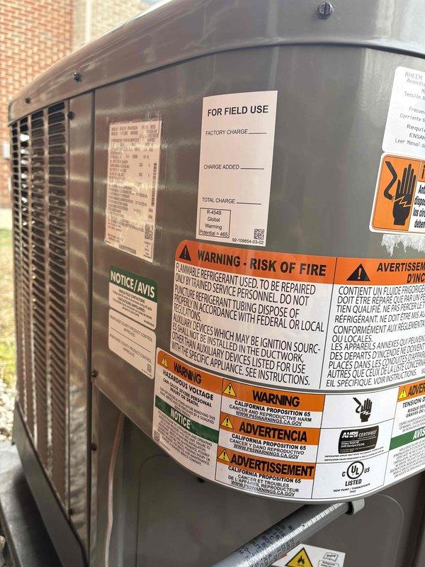 Successfully installed a complete Ruud/Rheem 2.5 ton heat pump system featuring a RP14AY30AJ2NA outdoor unit (14.3 SEER2), RH2TY3617STANNJ air handler with WWRX1502BI 15KW heat kit, and digital programmable thermostat. Installation included all necessary components: outdoor unit pad, snow legs, electrical connections, refrigerant line insulation/filter, drainage system with SS2 safety water sensor and overflow protection, and proper transition to existing ductwork.