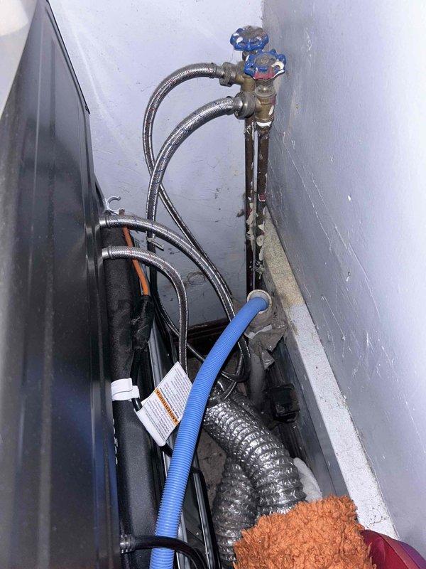 Performed routine plumbing inspection as requested in PSA. Examined copper supply lines which showed normal oxidation and mineral deposits in the crawl space/utility area. Inspected brass shut-off valve with blue handle and associated braided stainless steel supply lines, confirming proper installation and function. No immediate issues requiring repair were identified.